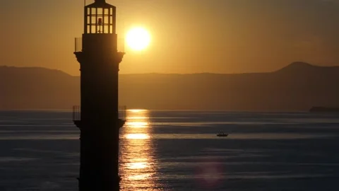 Chania town by night, Lighthouse, Drone shot, Crete, Greece, Aerial view of Chan Stock Footage 310564920