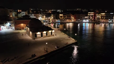 Chania town by night, Lighthouse, Drone shot, Crete, Greece, Aerial view of Chan Stock Footage 310746331