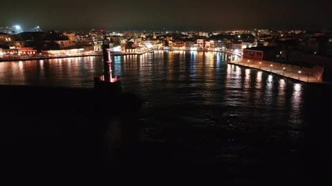 Chania town by night, Lighthouse, Drone shot, Crete, Greece, Aerial view of Chan Stock Footage 310852658