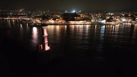 Chania town by night, Lighthouse, Drone shot, Crete, Greece, Aerial view of Chan Stock Footage 311054231