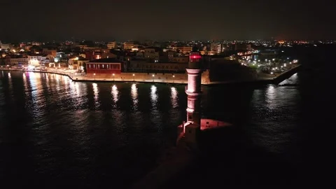 Chania town by night, Lighthouse, Drone shot, Crete, Greece, Aerial view of Chan Stock Footage 311130448