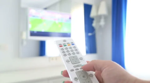 Channel Surfing With Tv Remote Control In Hand 2 Stock Footage 64736471