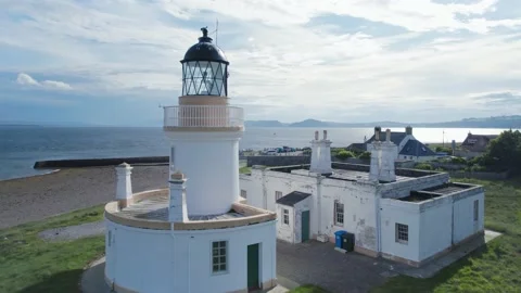 Chanonry Lighthouse on the Black Isle from a drone, Chanonry Point, Scotland 스톡 동영상 197048428