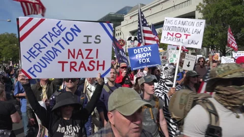 Chanting, arriving at No Kings protest, DC stock footage Stock Footage 319408792
