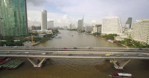 Chao Phraya River and Saphan Taksin Bridge, Bangkok, Thailand, Aerial Drone Shot Stock Footage 78626989