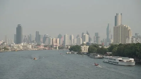 The Chao Phraya River, largest river in Bangkok, City Cityscape Skyline Stock Footage 297869124
