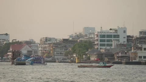 The Chao Phraya River, largest river in Bangkok, City Cityscape Skyline Stock Footage 297869503