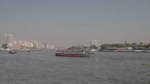 The Chao Phraya River, largest river in Bangkok, City Cityscape Skyline Stock Footage 297882436