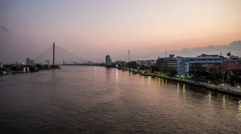 Chao Phraya river with skyline and suspension bridge in the morning Timelapse Stock Footage 48631838
