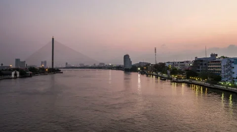 Chao Phraya river with skyline and suspension bridge in the morning Timelapse Stock Footage 48634457