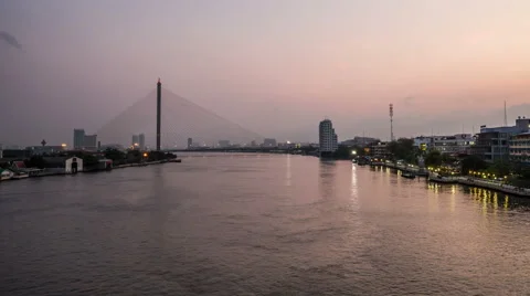 Chao Phraya river with skyline and suspension bridge in the morning Timelapse Stock Footage 48637008