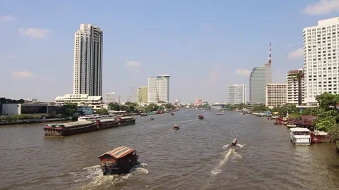 Chao phraya river view with rice barge and longtails boat Stock Footage 131071316
