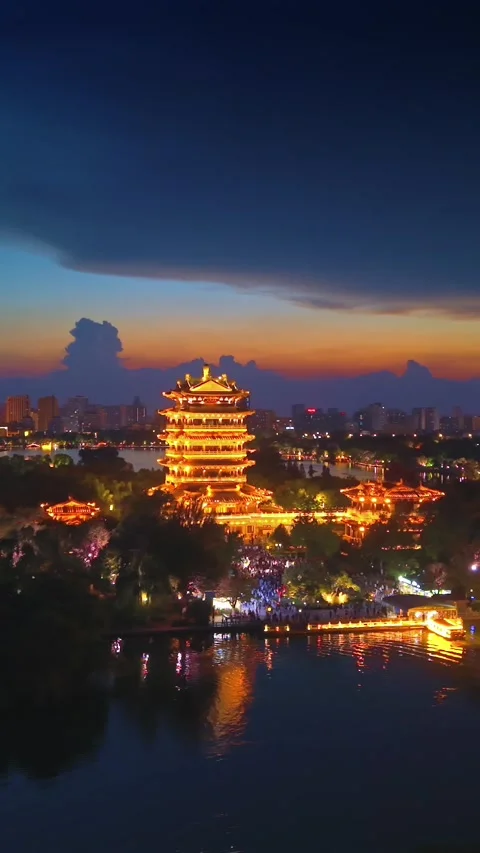 Chaoran Tower Illuminated at Sunset over Daming Lake, Jinan Stock Footage 331121350
