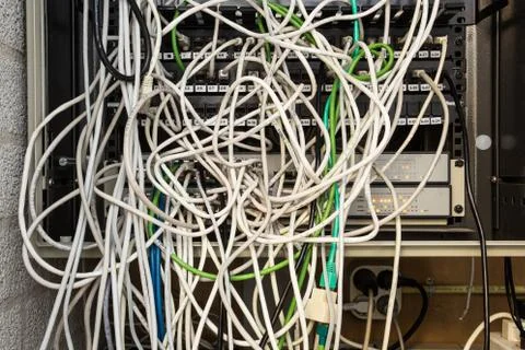 Chaos of network cables tangled 库存照片
