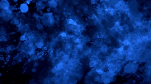 Chaotic blue motion graphics scene, where various-sized particles form a Stock Footage 320393416