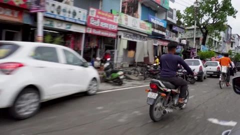 Chaotic Busy Roads and Crowded Markets in India from Moving Vehicle Stock Footage 281157208