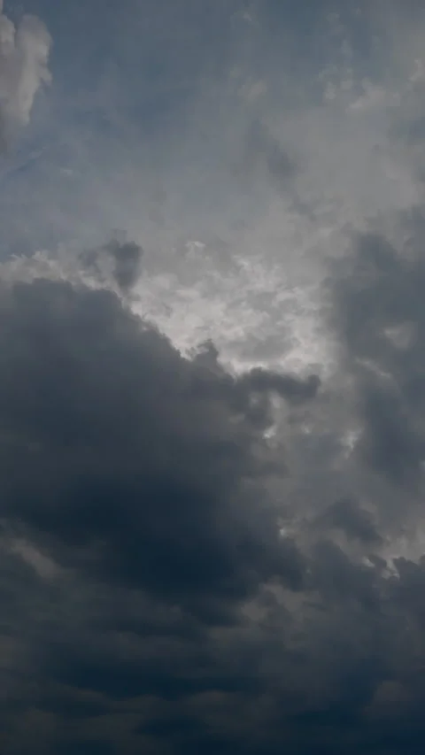 Chaotic clouds evoke tension. Churning storm clouds generate intense sky drama 스톡 동영상 334012522