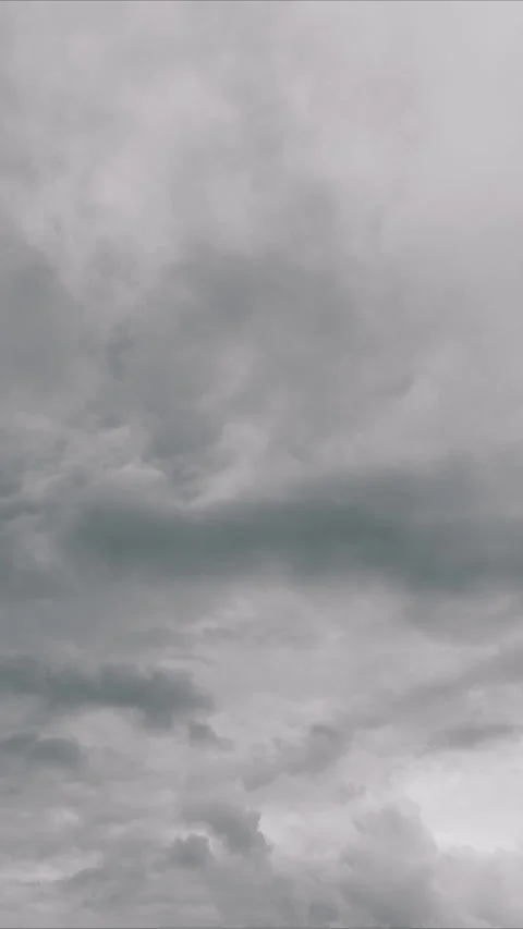 Chaotic clouds foretell approaching tempest, Tempest clouds swirl in turbulent s Stock Footage 325672632