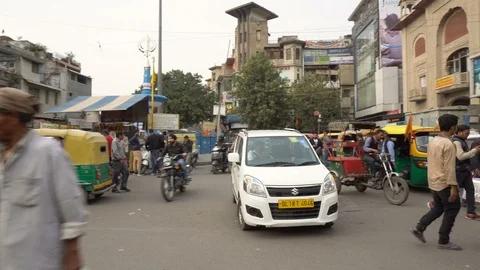 Chaotic Intersection of People and Traffic in Old Delhi, India Stock Footage 124840266
