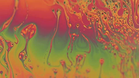 Chaotic liquid motion of psychedelic multicolored colors of soap bubble Stock Footage 144447745