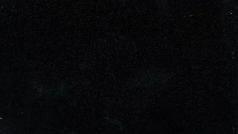 Chaotic movement of small luminous particles in a haze of transparent space on a Stock Footage 168440415