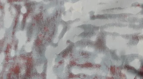 A chaotic pattern of white spray paint on rusty metal Stock Photos