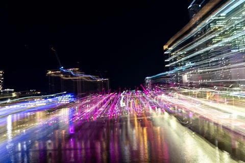 Chaotic patterns shapes and reflections of urban night lights shot using in.. Stock Photos