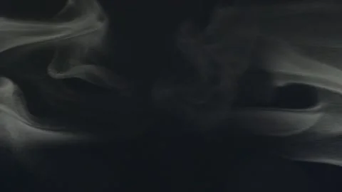 Chaotic smoke on black background. Cloud of cold fog on black background. Stock Footage 162768088