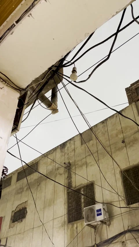Chaotic Tangled Power Lines and Old Urban Architecture Vidéo 332087118