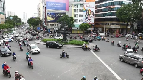 Chaotic Traffic at a Roundabout in Ho Chi Minh City, Vietnam. 動画素材 347137076