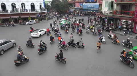Chaotic traffic scene at a busy intersection in Hanoi, Vietnam Stock Footage 60937924