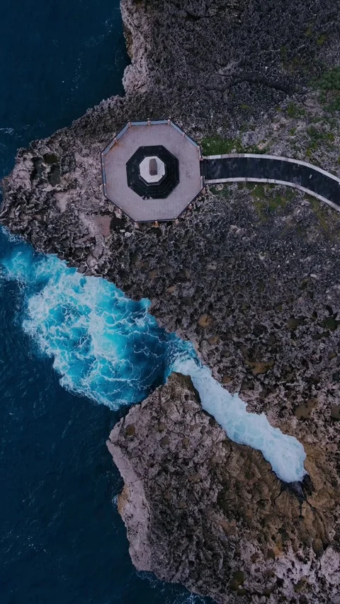 Chaotic Waves Collide With Rugged Cliffs And Spray Foam Everywhere Stock Footage 325665170