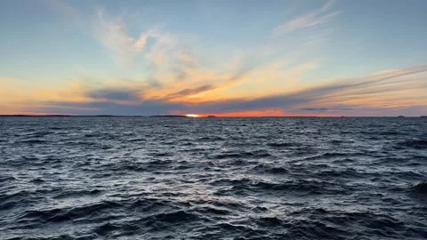 Chaotic waves on dark sea at sunset Stock Footage 287168419