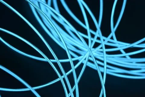 Chaotically celestial, light blue, neon harness, illuminated wire, thin wire. Fotos de archivo