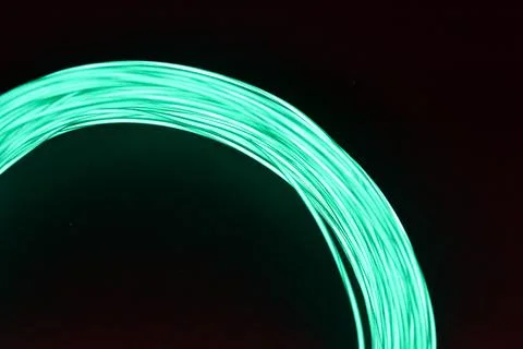 Chaotically celestial, light blue, neon harness, illuminated wire, thin wire. Fotos de archivo