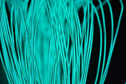Chaotically celestial, light blue, neon harness, illuminated wire, thin wire. Fotos de archivo