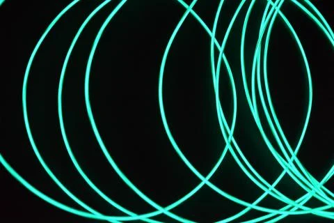 Chaotically celestial, light blue, neon harness, illuminated wire, thin wire. Fotos de archivo