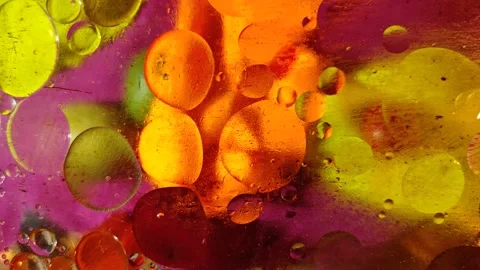 Chaotically moving multicolored bubbles in a viscous liquid substance. Stock-Footage 147199433