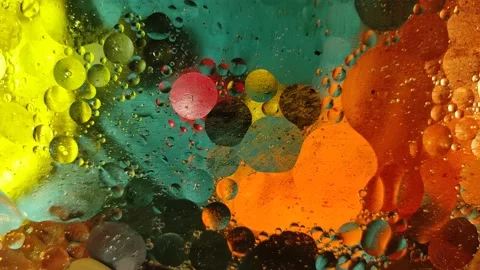 Chaotically moving multicolored bubbles in a viscous liquid substance. Stock-Footage 149620099