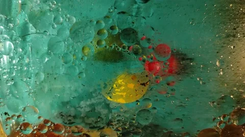 Chaotically moving multicolored bubbles in a viscous liquid substance. Stock-Footage 149620324