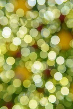 Chaotically placed bokeh circles shine with festive lights. Festive Christm.. Stock Photos