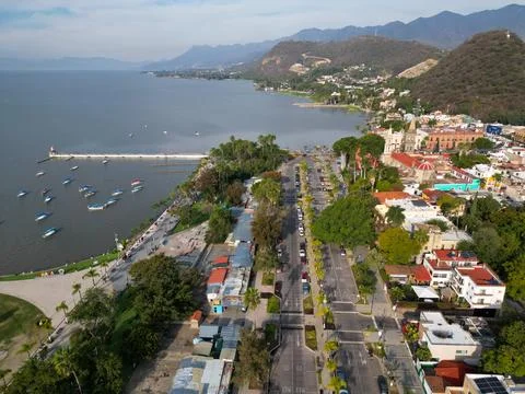 Chapala, Mexico: Drone panoramic view of lake, pier, boats, town, mountains Фото