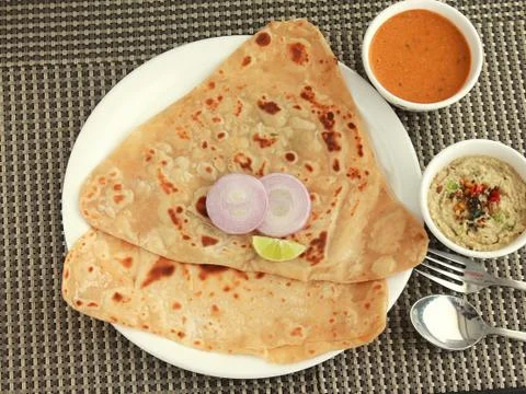 Chapathi (flat bread) &amp; curry Stock Photos