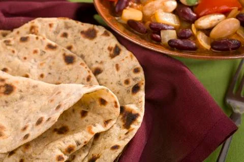 Chapatis and vegetable curry Stock Photos