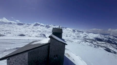Chapel with the Alps (Dachstein) in the background Stock Footage 277608801