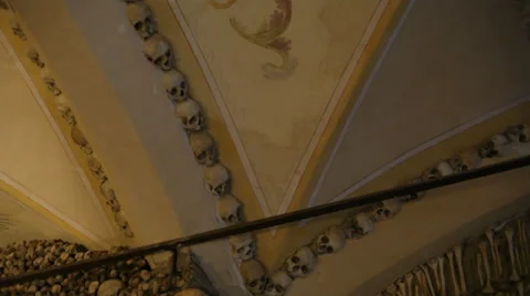 Chapel of Bones wall ceiling, skeletons, skulls, church, tilt down, Portugal Stock Footage 59615595