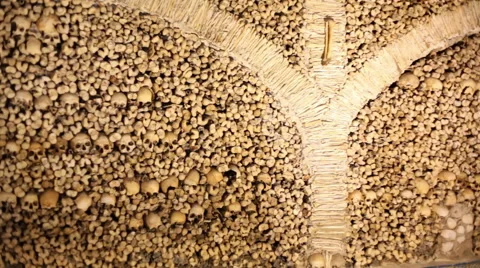 Chapel of Bones wall, skeletons, skulls, church, pan left, Evora, Portugal Stock Footage 59615557