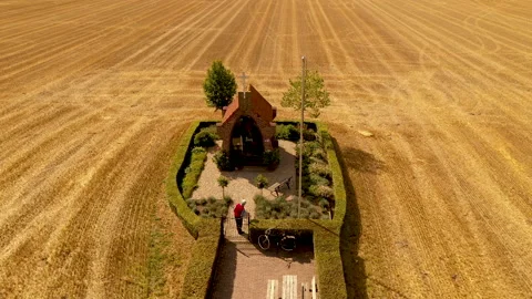Chapel in grain field 스톡 동영상 138047102