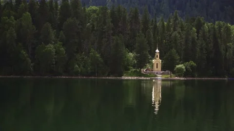 Chapel by the lake in the coniferous forest Stock-Footage 144844048