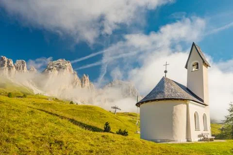 Chapel with mountain view in background, Passo Gardena Dolomite Mountains Italy Stock Photos